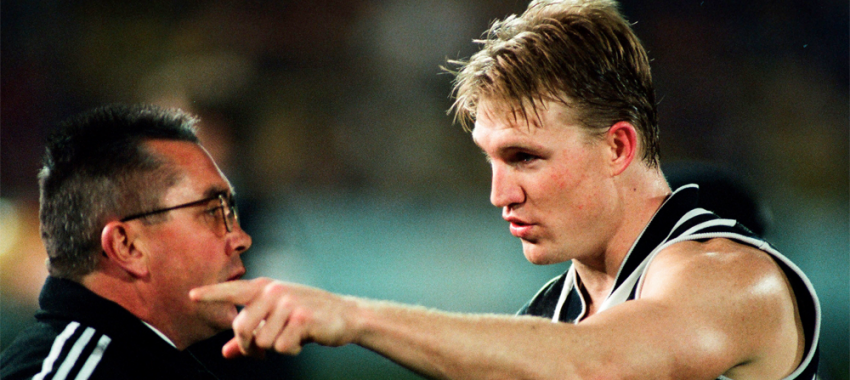 Captain Nathan Buckley speaks to coach Tony Shaw during the round 16 contest against Hawthorn at Waverley Park in 1998.