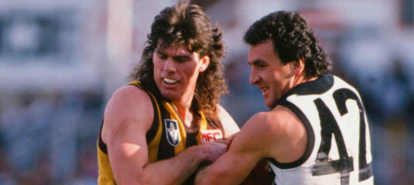 Gary Ayres of the Hawks clashes with Darren Millane of the Magpies during the 1988 VFL match.