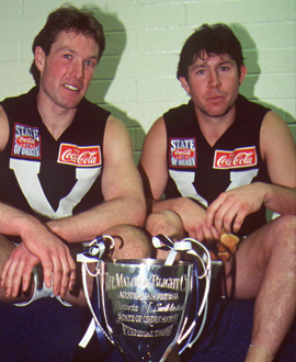 Gavin Brown, captain of the Victorian side, and Brett Ratten in the rooms after the 1997 win over South Australia.