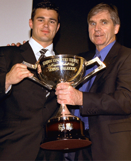 Chris Tarrant accepts the Gordon Coventry Award from Peter McKenna during the 2001 Copeland Trophy night.
