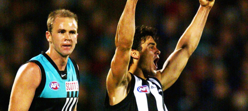 Chris Tarrant celebrates Collingwood's famous win against Port Adelaide in the 2002 Qualifing Final, while reality sets in for his direct opponent Matthew Bishop.